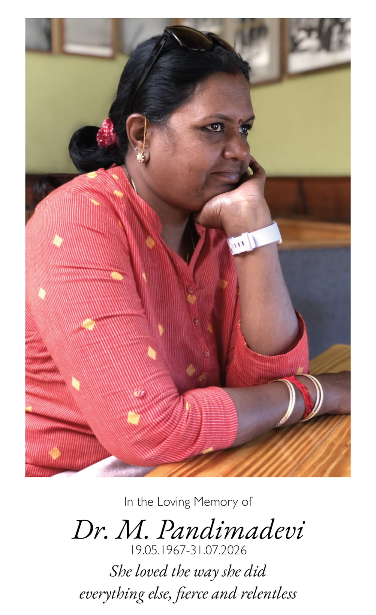 Amma in profile, resting her chin on her hand at a table. She loved the way she did everything else, fierce and relentless.