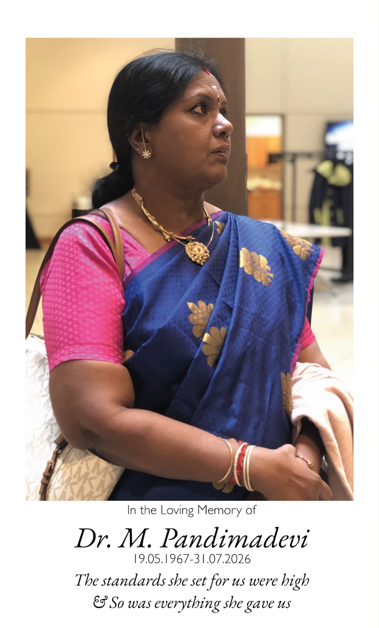 Amma in a navy blue silk saree. The standards she set for us were high, and so was everything she gave us.